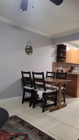 a view of a workspace with furniture