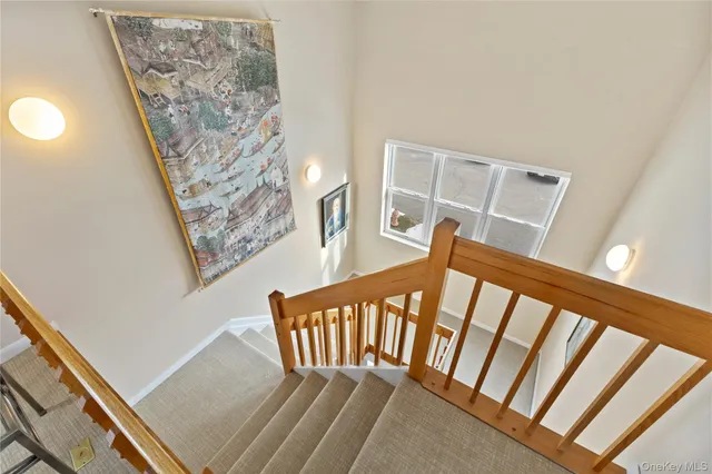 a view of a balcony with furniture