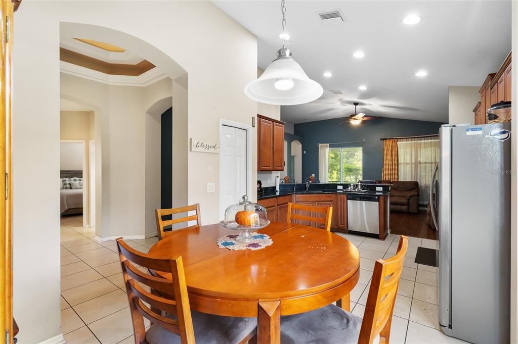 10925 Rockledge View Drive Riverview, FL 33579 - Photo 18 of 49 a view of a dining room with furniture and a large window