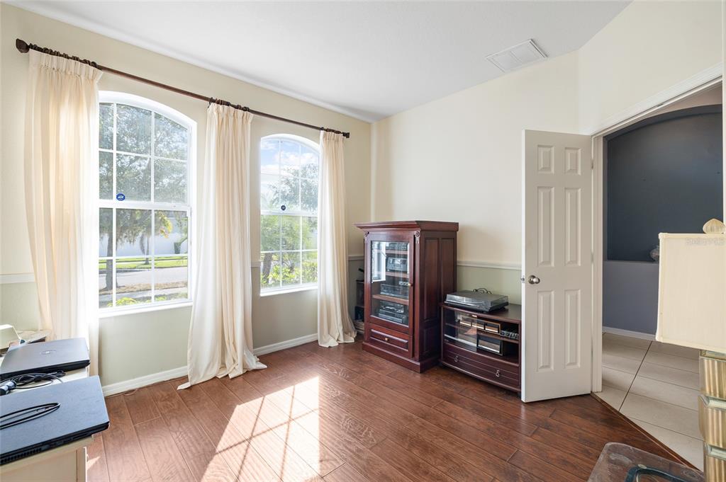 10925 Rockledge View Drive Riverview, FL 33579 - Photo 7 of 49 a view of livingroom with furniture and a dresser
