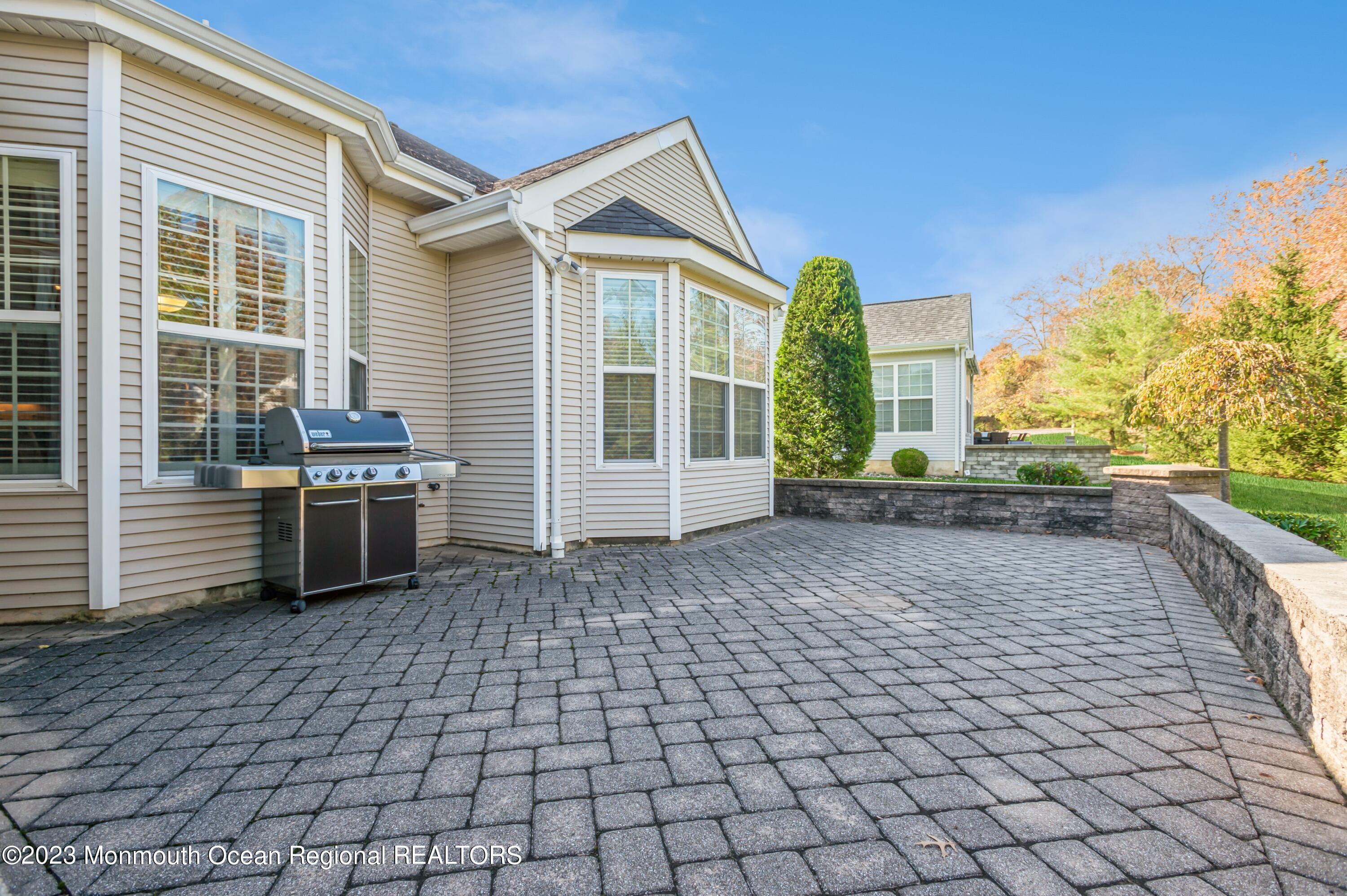 33 Lusitano Road Manalapan, NJ 07726 - Photo 24 of 28 24_33LusitanoRd_85_Patio_HiRes