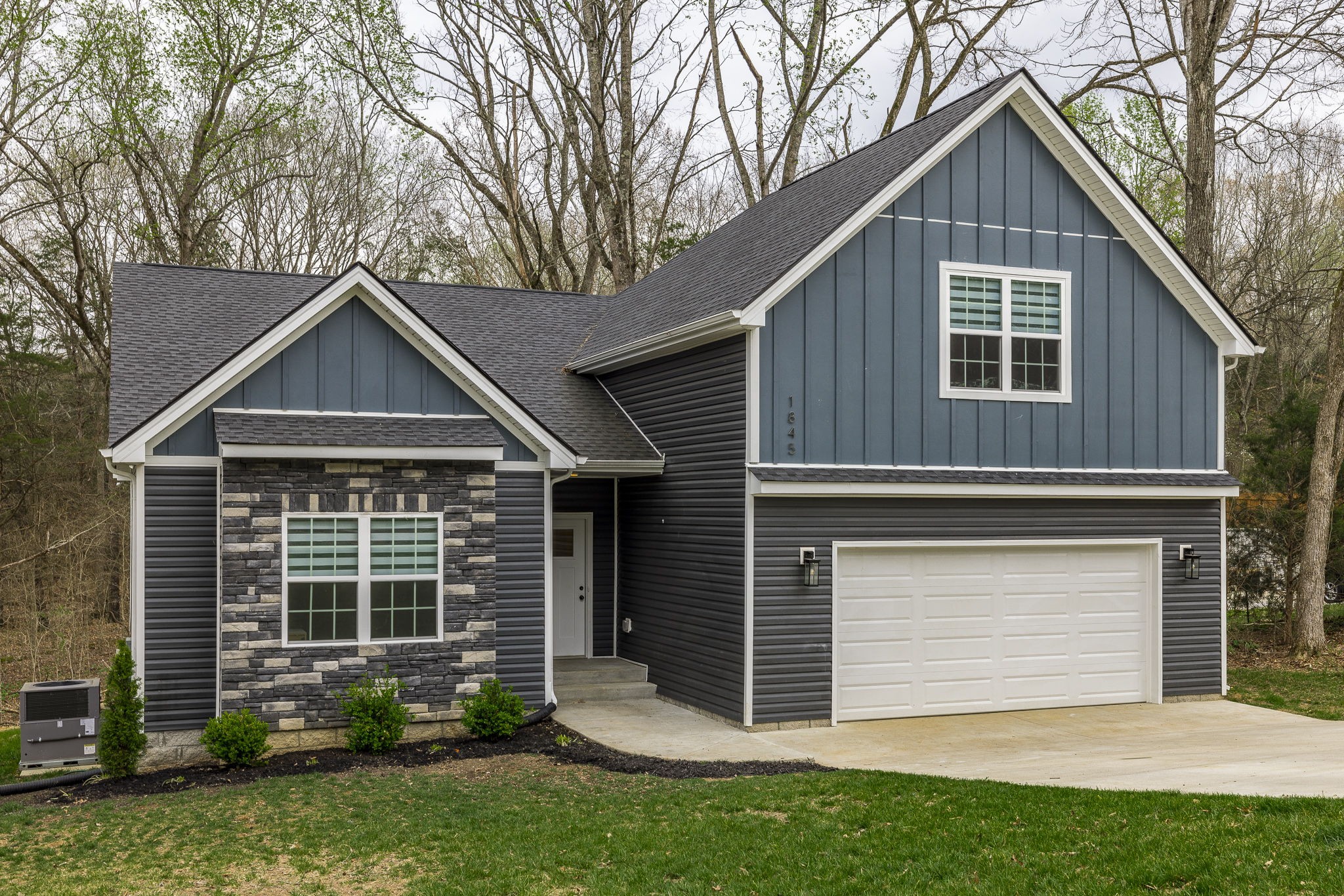 1845 Dinsmore Road Clarksville, TN 37040 - Photo 1 of 70 a front view of a house with a yard and garage
