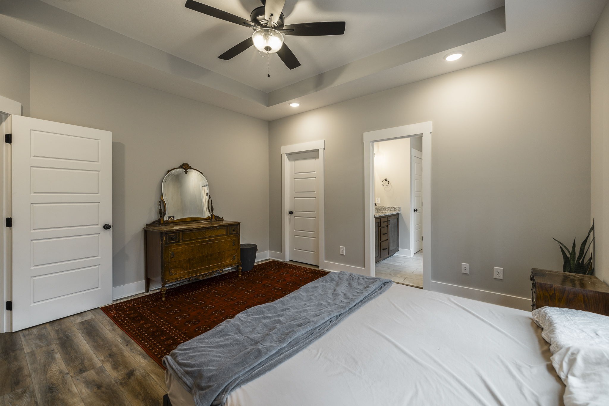 1845 Dinsmore Road Clarksville, TN 37040 - Photo 12 of 70 a bedroom with a bed and cabinet with mirror
