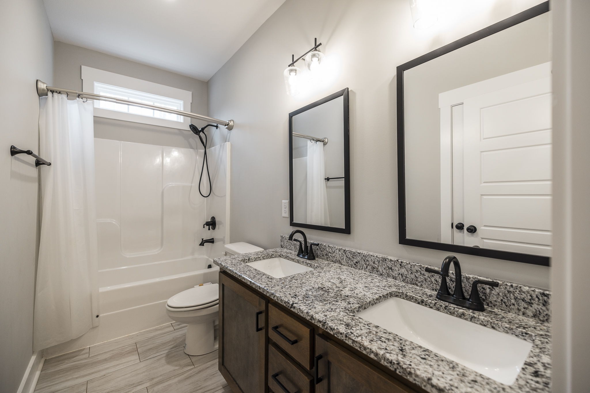 1845 Dinsmore Road Clarksville, TN 37040 - Photo 15 of 70 a bathroom with a granite countertop sink toilet and shower