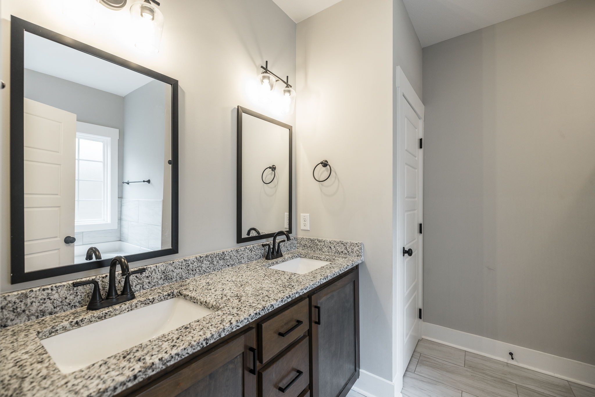 1845 Dinsmore Road Clarksville, TN 37040 - Photo 17 of 70 a bathroom with a granite countertop sink and a mirror