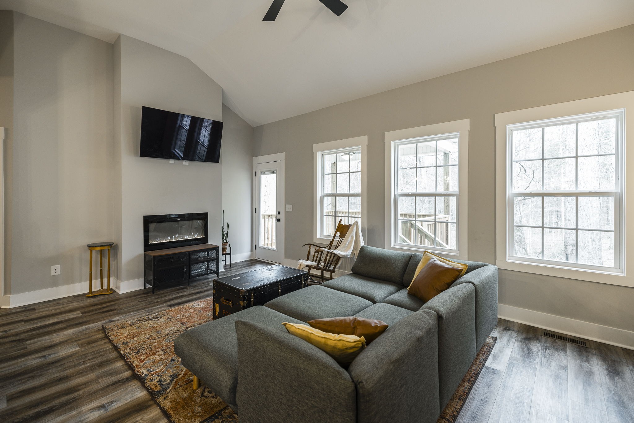 1845 Dinsmore Road Clarksville, TN 37040 - Photo 30 of 70 a living room with furniture a flat screen tv and a fireplace