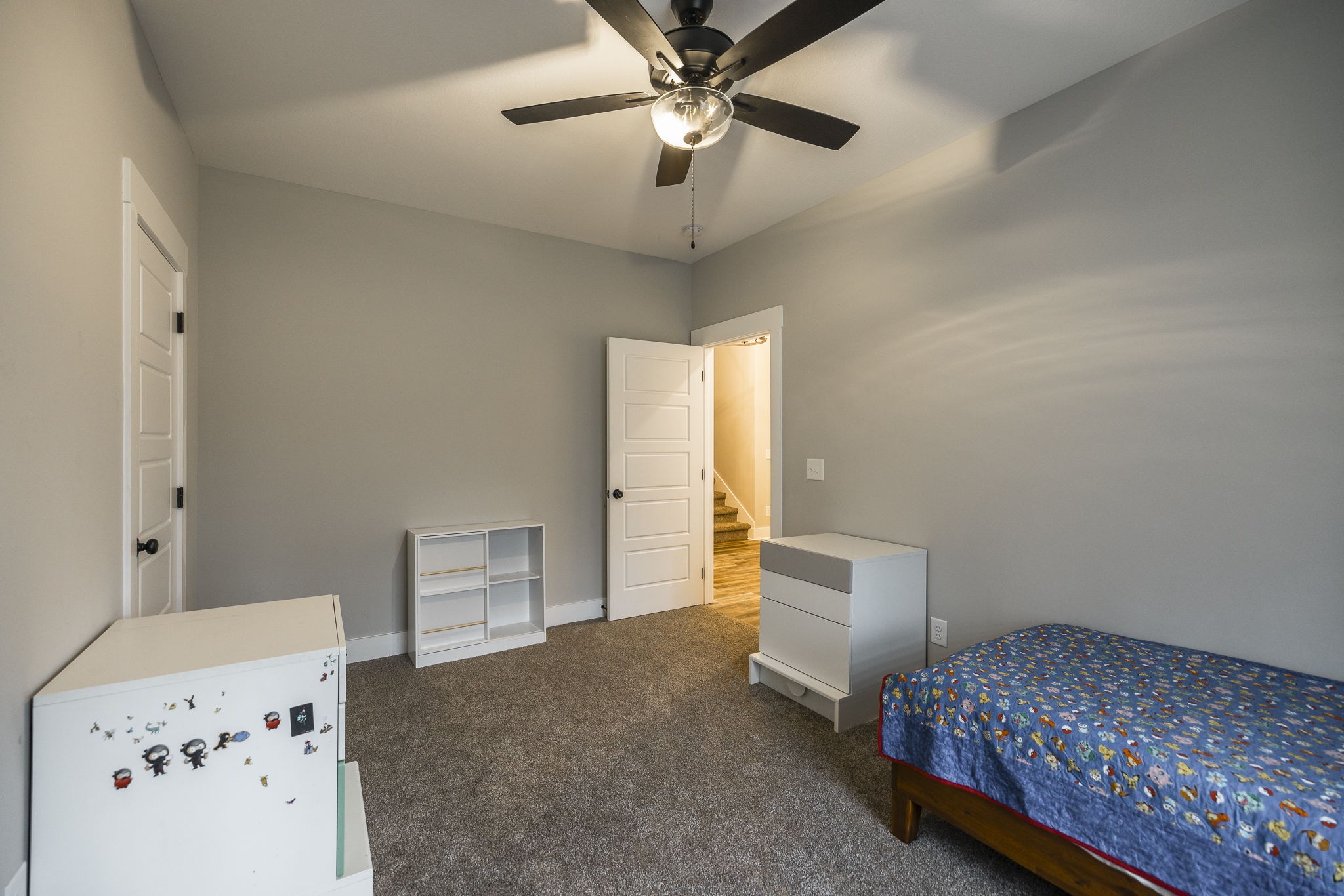 1845 Dinsmore Road Clarksville, TN 37040 - Photo 61 of 70 a bedroom with a bed and a chandelier