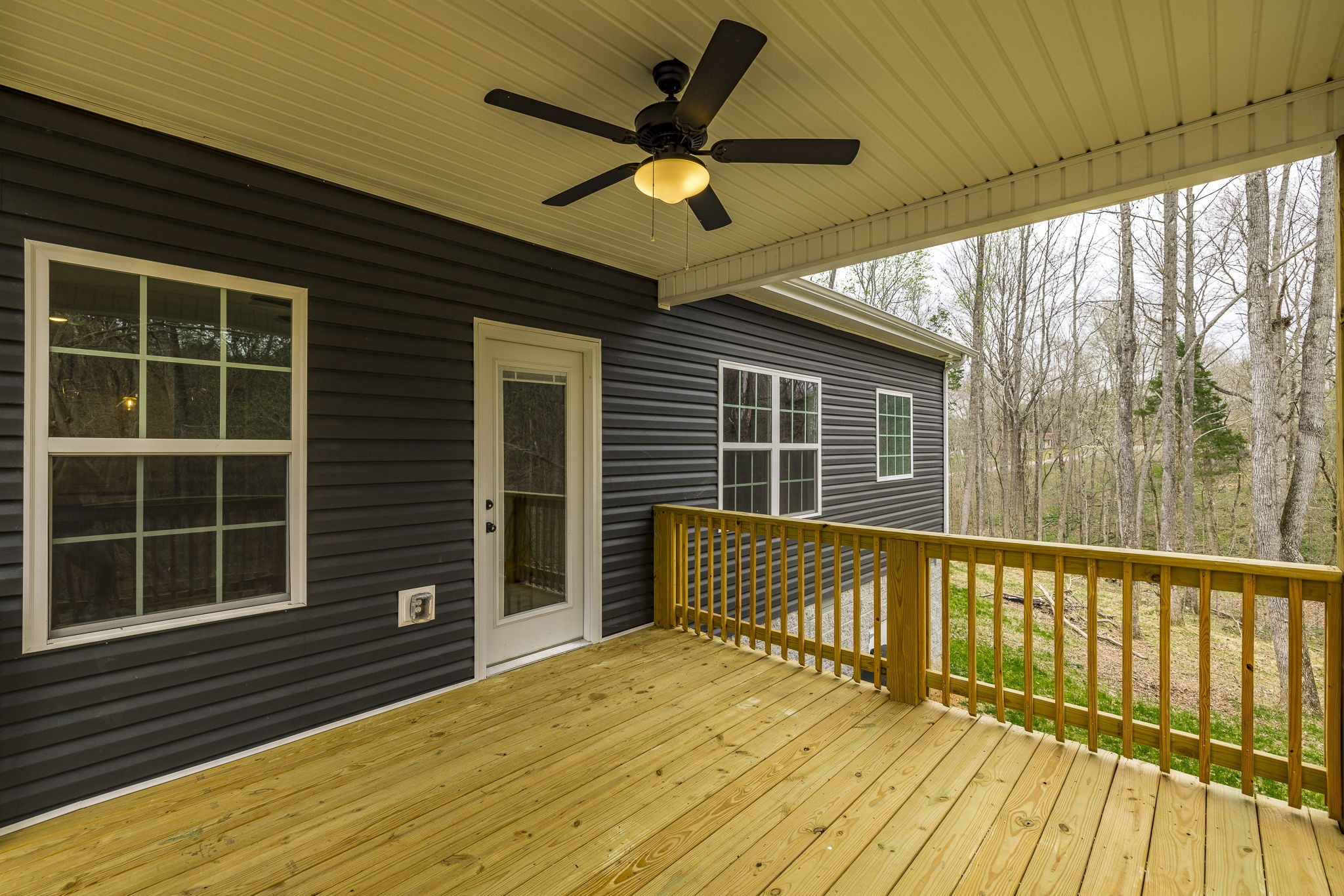 1845 Dinsmore Road Clarksville, TN 37040 - Photo 65 of 70 a view of a balcony with a ceiling fan