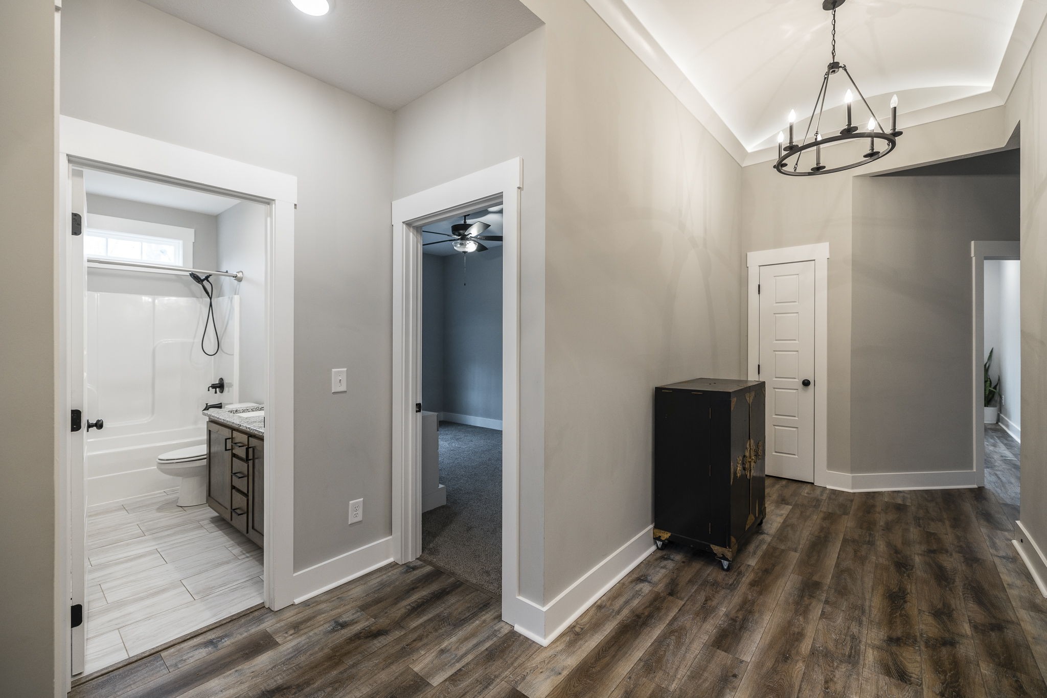 1845 Dinsmore Road Clarksville, TN 37040 - Photo 8 of 70 a view of a hallway view with wooden floor and a bathroom