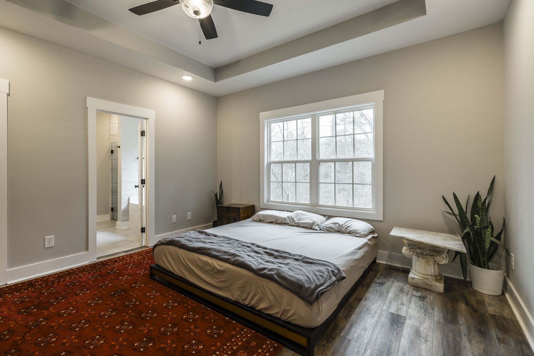 1845 Dinsmore Road Clarksville, TN 37040 - Photo 10 of 70 a bedroom with a large bed and a chandelier