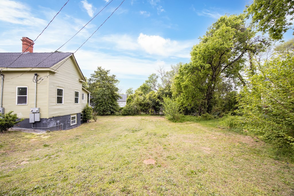 2113 Summerville Road Phenix City, AL 36867 - Photo 34 of 37 a view of a house with a yard