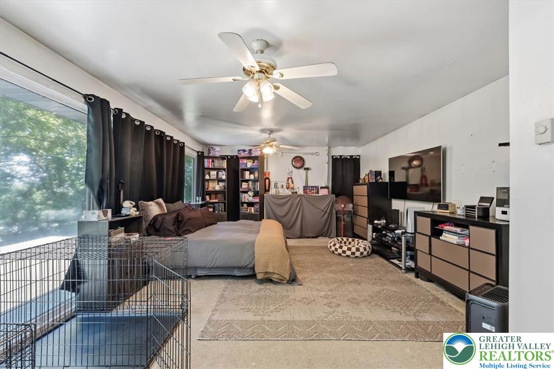 5340 2nd Street Whitehall, PA 18052 - Photo 15 of 30 Natural illumination fills this adaptable living area, perfect for diverse activities and daily repose.