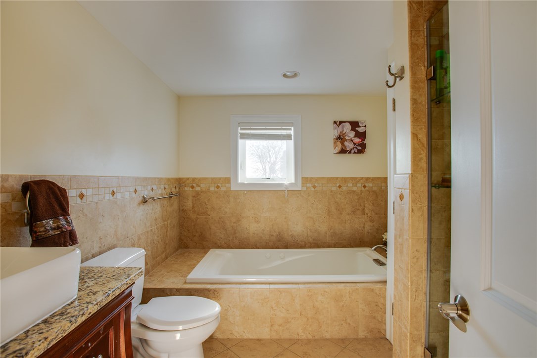 7 Stonegate Road Warren, RI 02885 - Photo 26 of 34 Lower Level Guest Bathw with granite and tile.