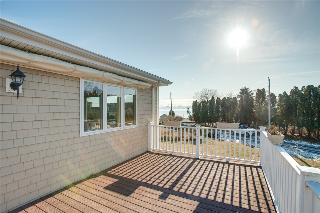 7 Stonegate Road Warren, RI 02885 - Photo 28 of 34 All weather, maintenance free wrap around deck.