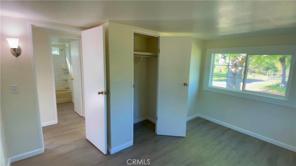 5440 Darrah Road Mariposa, CA 95338 - Photo 23 of 26 an empty room with windows and closet
