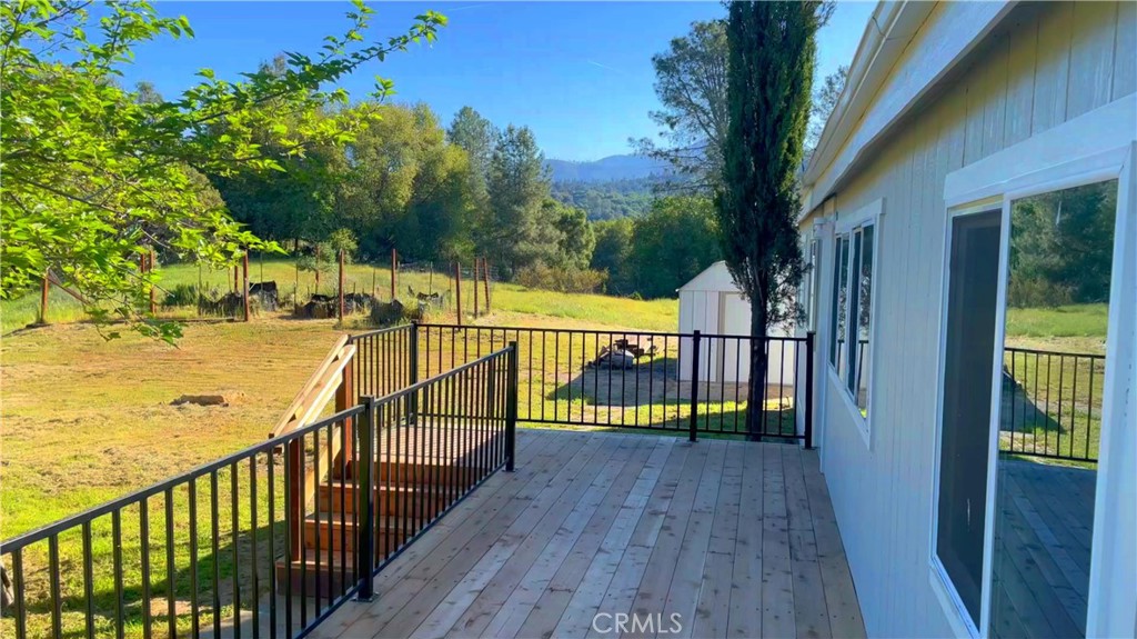 5440 Darrah Road Mariposa, CA 95338 - Photo 25 of 26 a view of balcony with wooden floor and fence