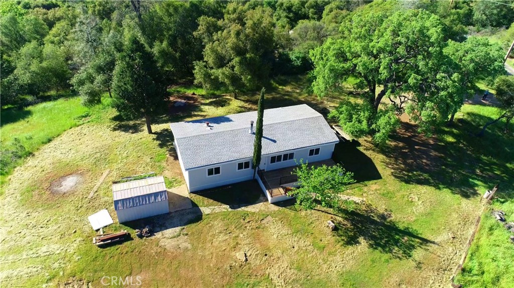 5440 Darrah Road Mariposa, CA 95338 - Photo 3 of 26 a view of a house with a yard and sitting area