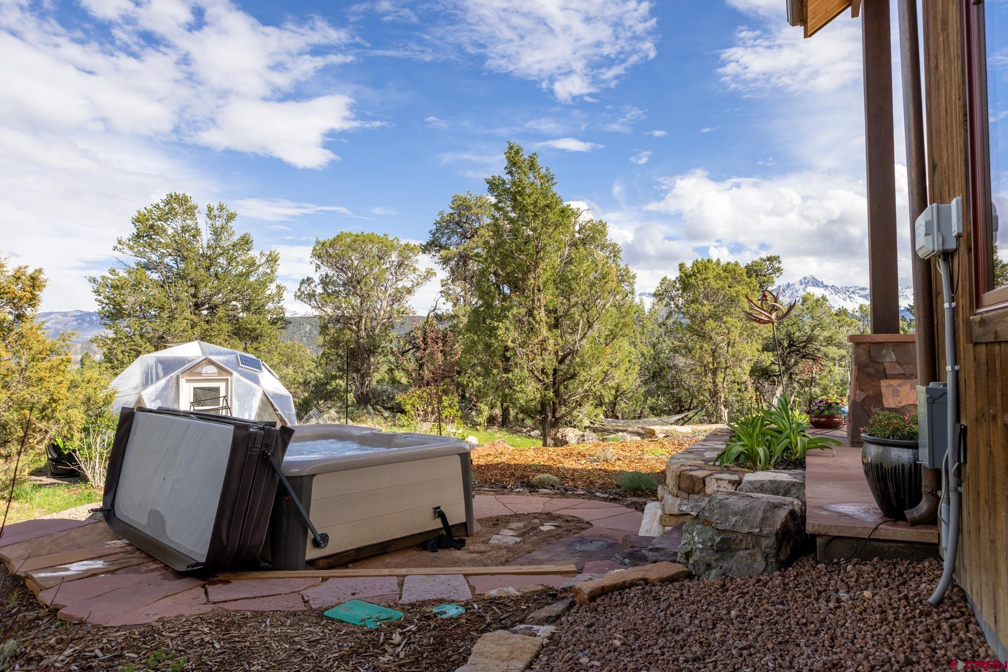 6534 Pleasant Point Drive Ridgway, CO 81432 - Photo 13 of 35 a view of a patio in the backyard