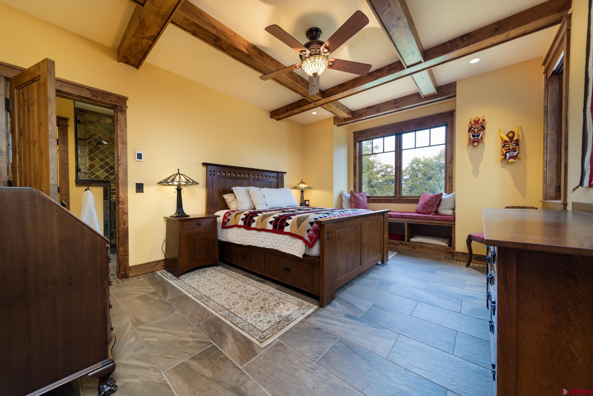 6534 Pleasant Point Drive Ridgway, CO 81432 - Photo 22 of 35 a living room with furniture and a large window