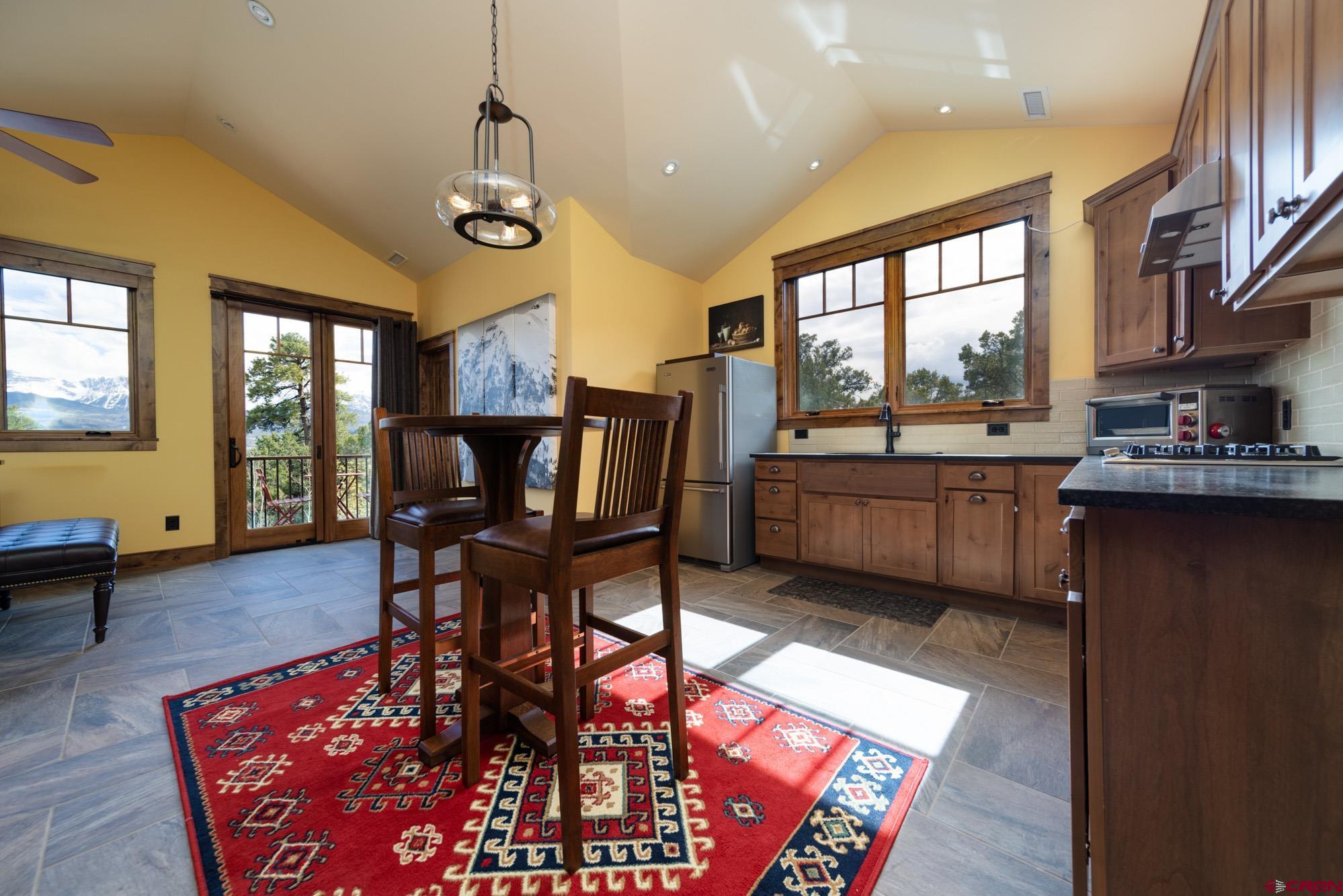 6534 Pleasant Point Drive Ridgway, CO 81432 - Photo 27 of 35 a dining room with furniture and window