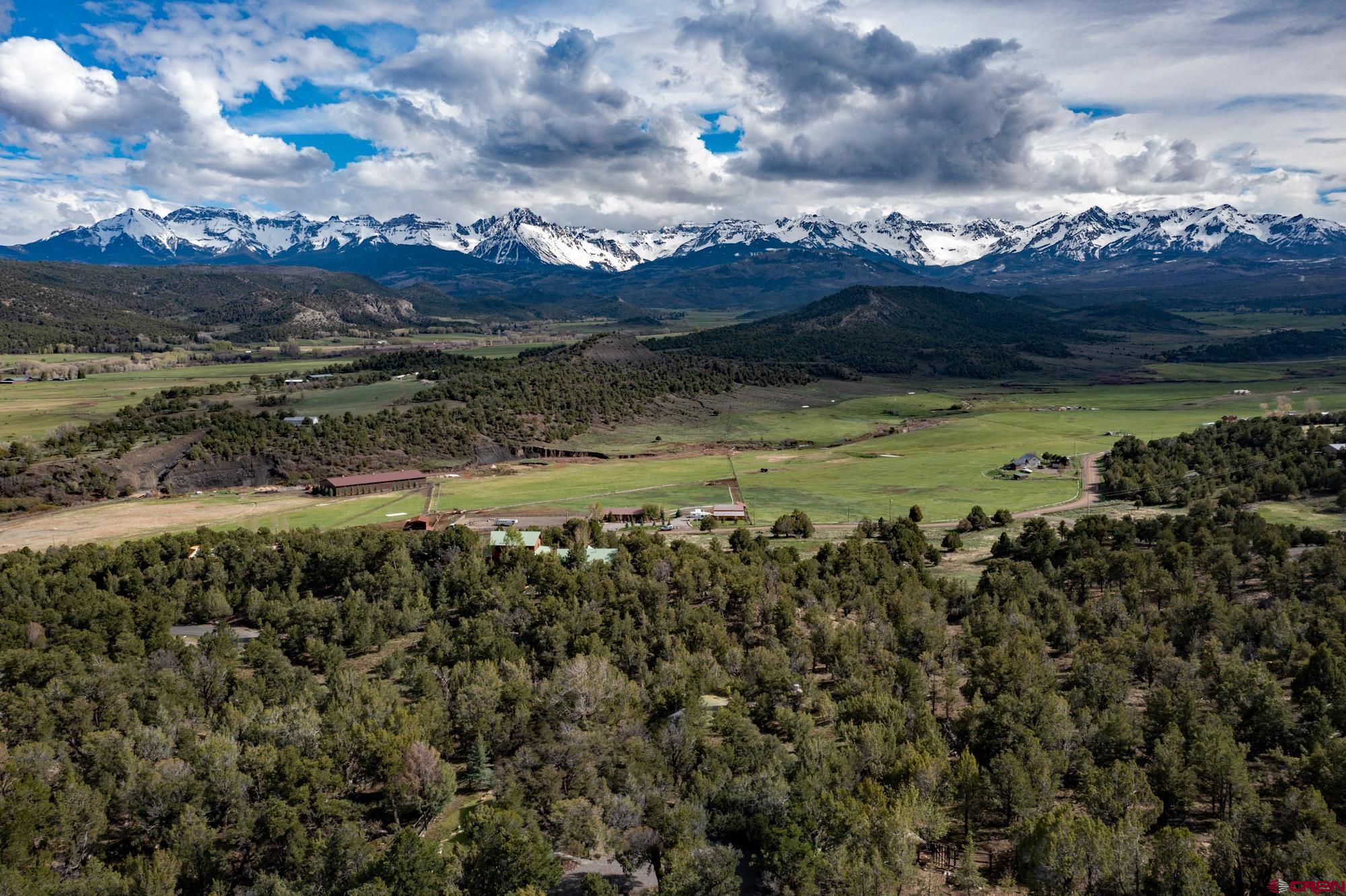 6534 Pleasant Point Drive Ridgway, CO 81432 - Photo 4 of 35 a view of a lake with a mountain