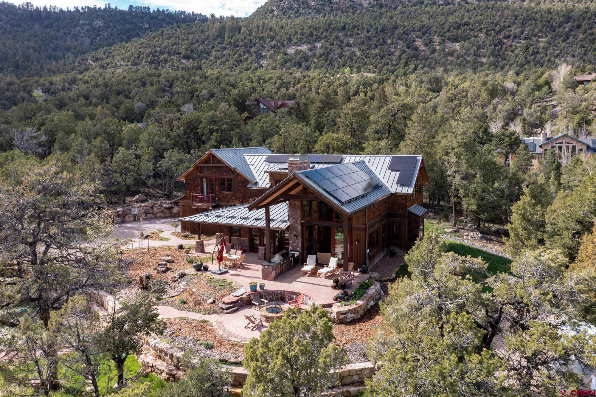6534 Pleasant Point Drive Ridgway, CO 81432 - Photo 7 of 35 an aerial view of a house with a yard and mountain