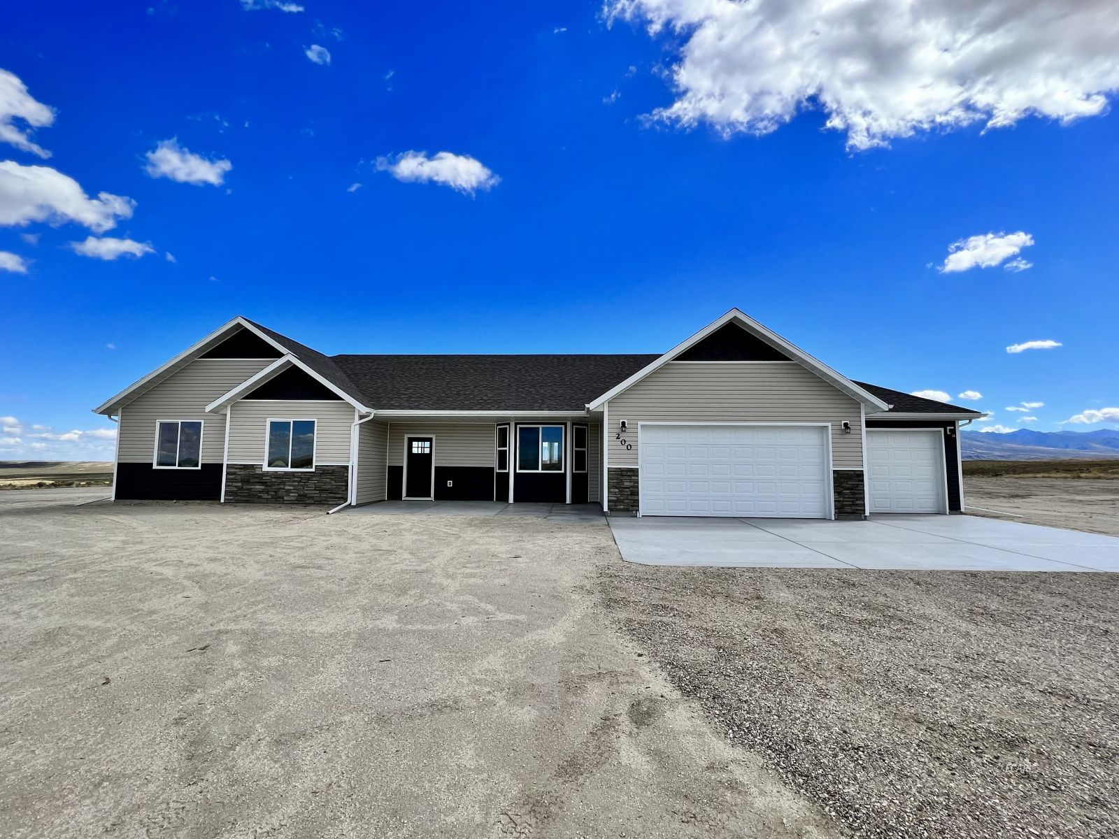 200 Ridgeway Drive Spring Creek, NV 89815 - Photo 31 of 34 a front view of a house with a yard