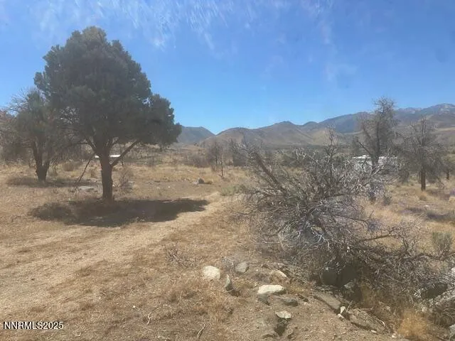 a view of a lake with mountains in the background