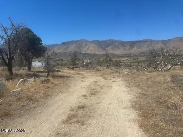 a view of mountain view with mountains in the background