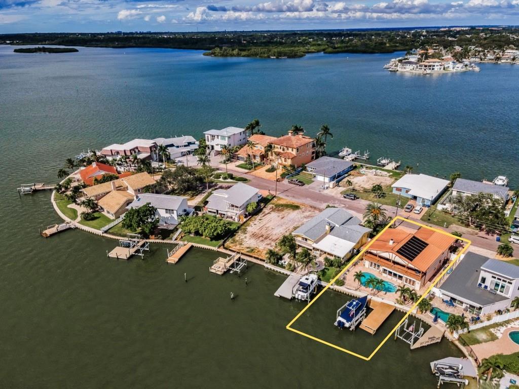 16108 6th Street East Redington Beach, FL 33708 - Photo 13 of 60 an aerial view of a house with outdoor space lake view