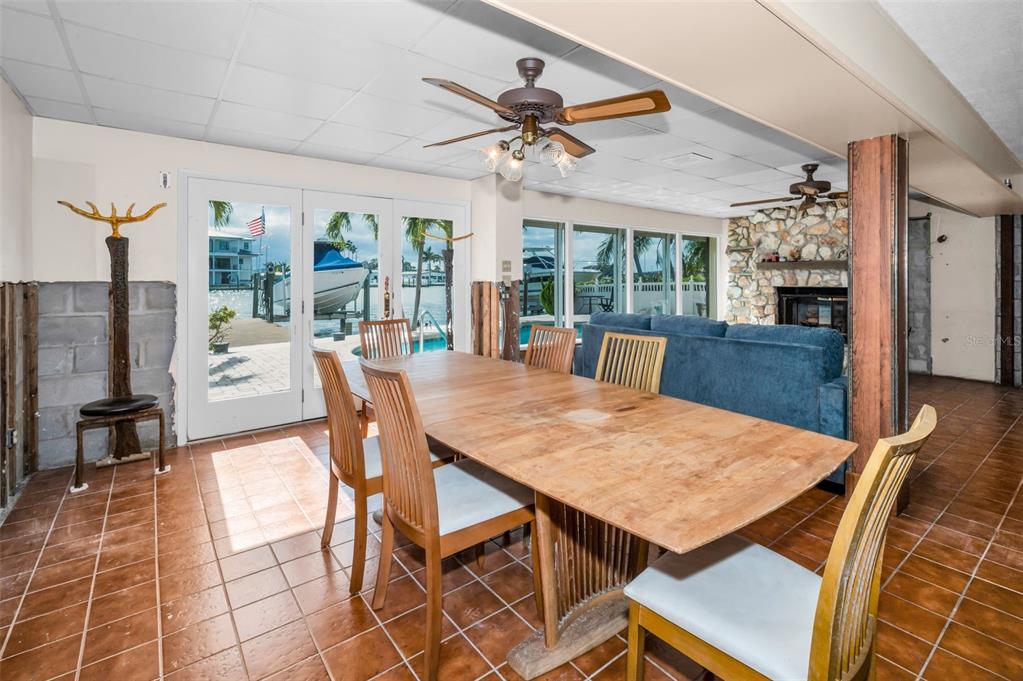 16108 6th Street East Redington Beach, FL 33708 - Photo 21 of 60 a view of a dining room with furniture window and outside view