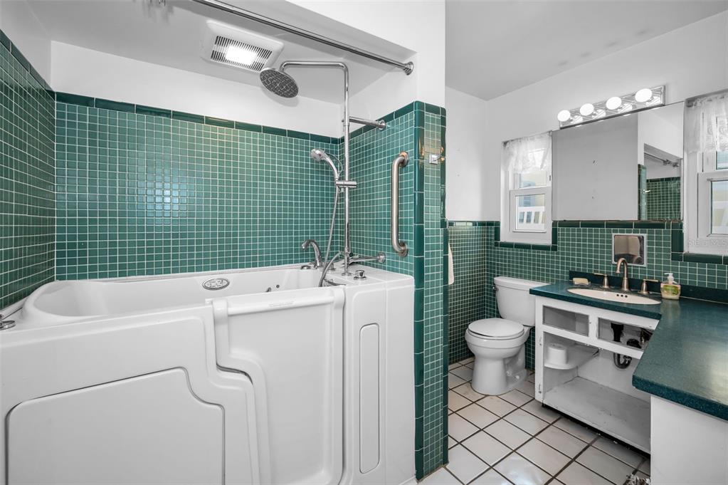 16108 6th Street East Redington Beach, FL 33708 - Photo 28 of 60 a bathroom with a sink toilet and shower