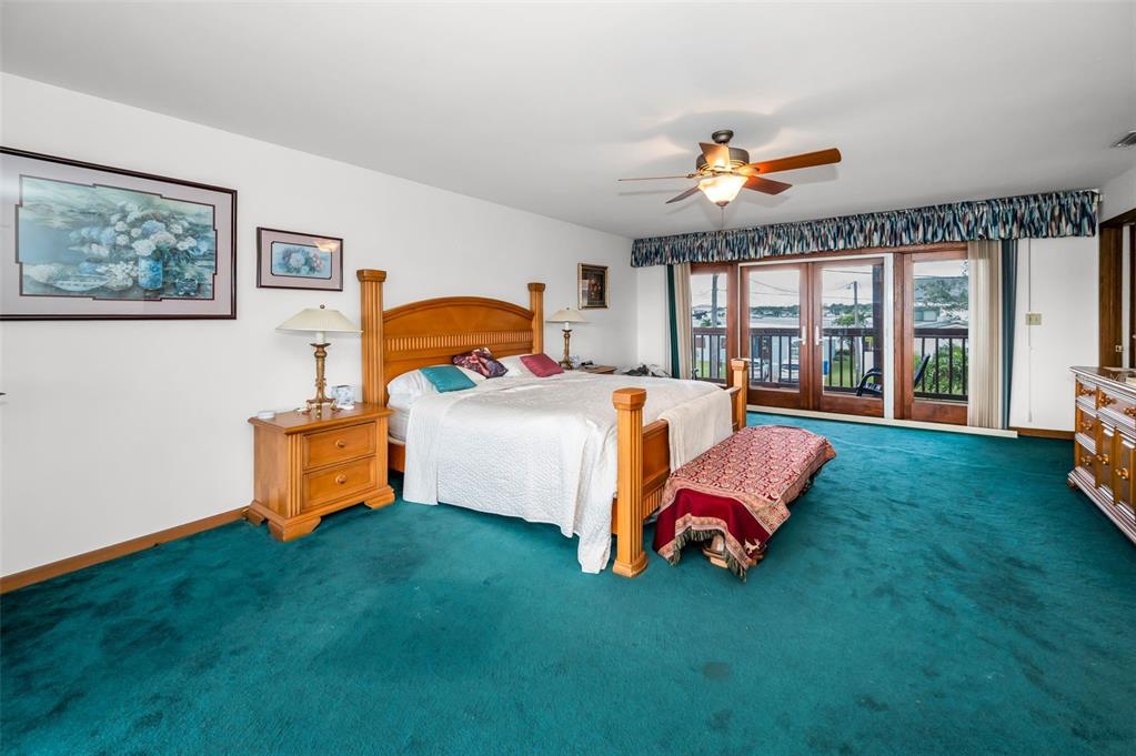 16108 6th Street East Redington Beach, FL 33708 - Photo 30 of 60 a room with pool table and windows