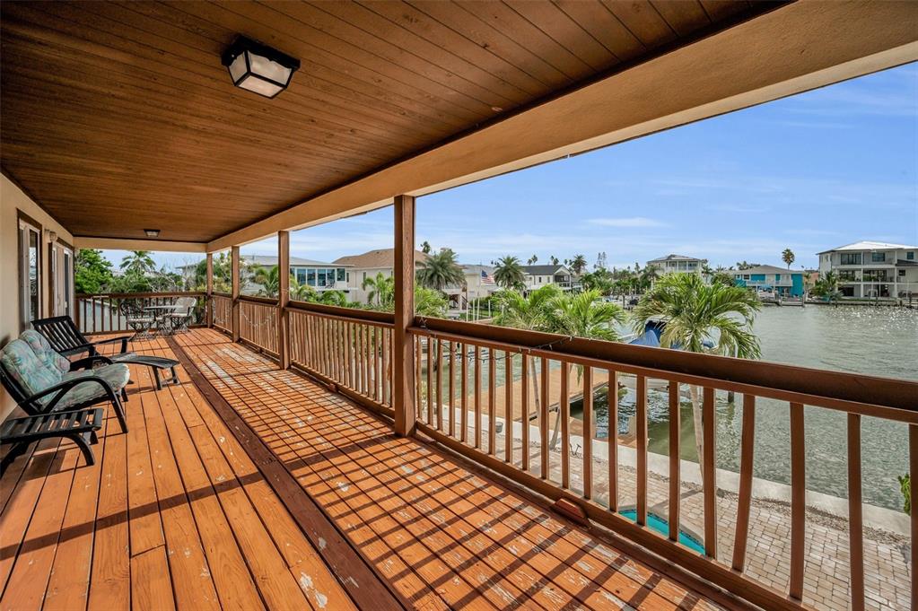 16108 6th Street East Redington Beach, FL 33708 - Photo 35 of 60 a view of balcony with wooden floor