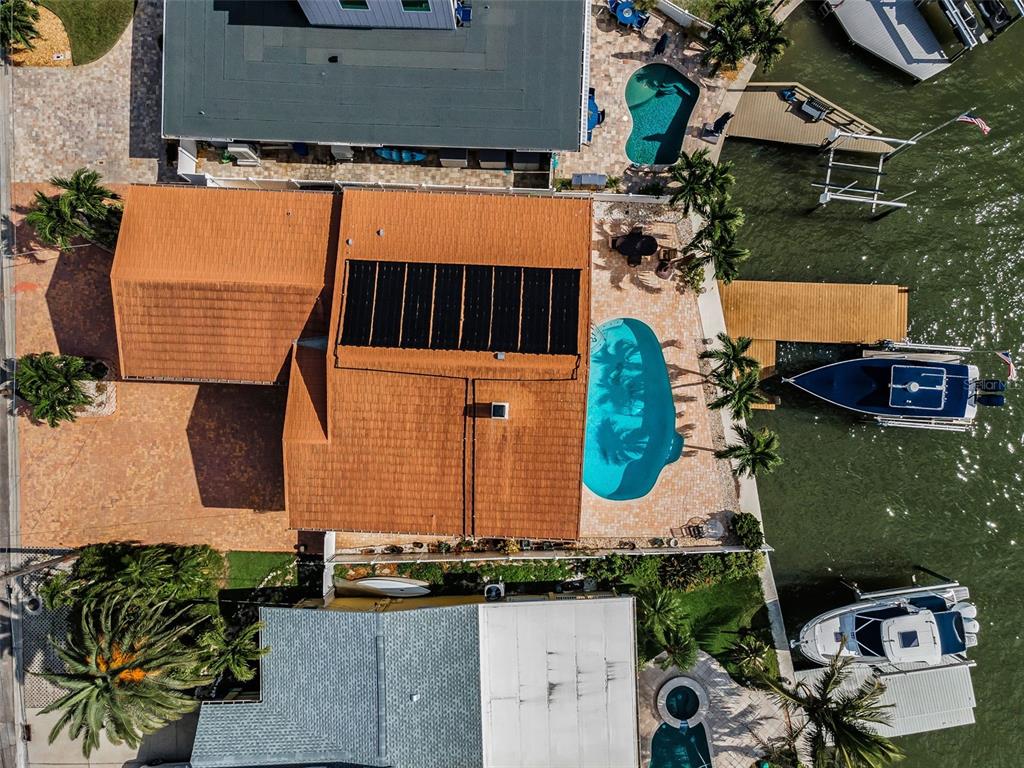 16108 6th Street East Redington Beach, FL 33708 - Photo 47 of 60 an aerial view of a house with a yard