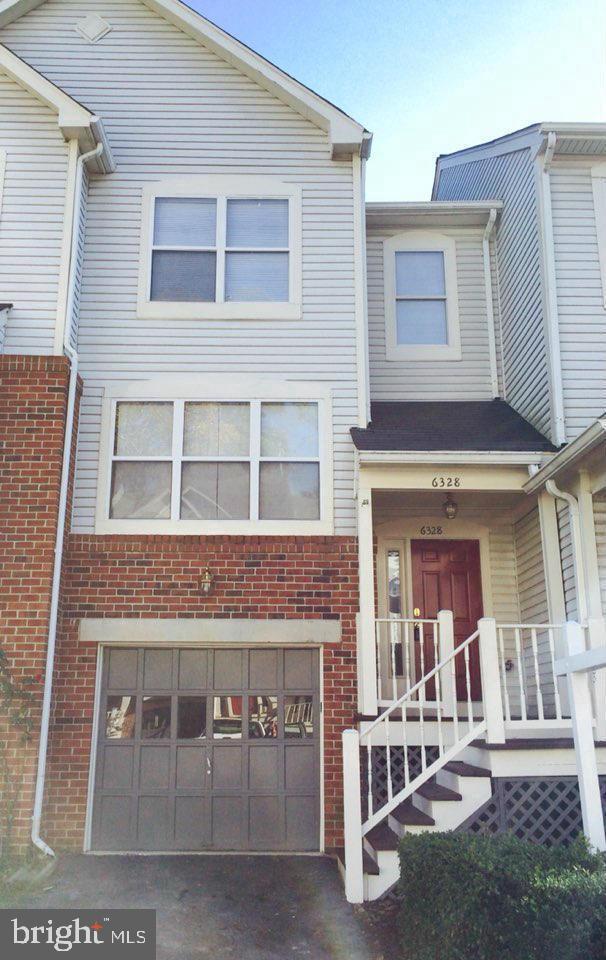 6328 Over See Court Springfield, VA 22152 - Photo 1 of 14 a front view of a house with a porch
