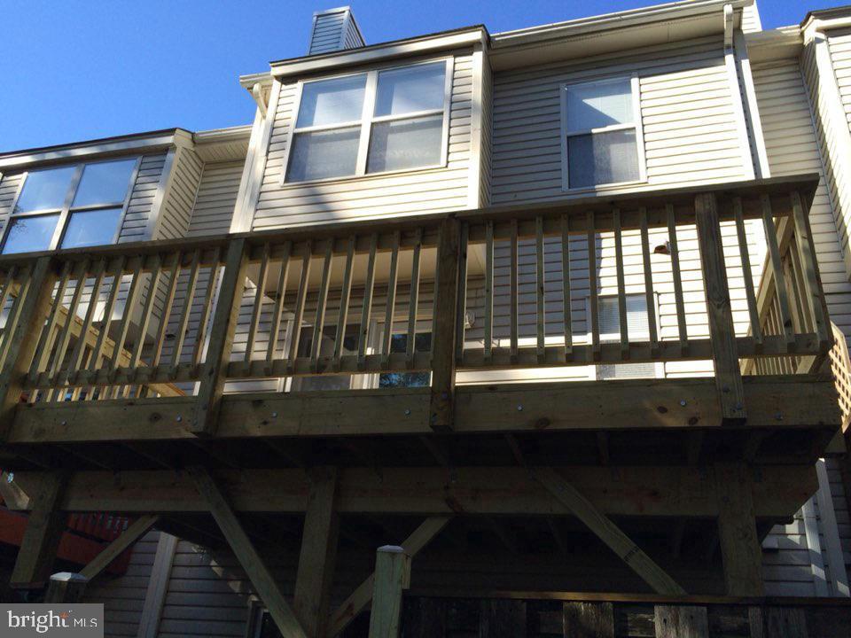 6328 Over See Court Springfield, VA 22152 - Photo 14 of 14 a front view of a house with a deck