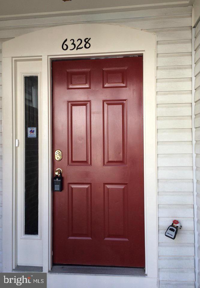 6328 Over See Court Springfield, VA 22152 - Photo 2 of 14 a view of wooden door