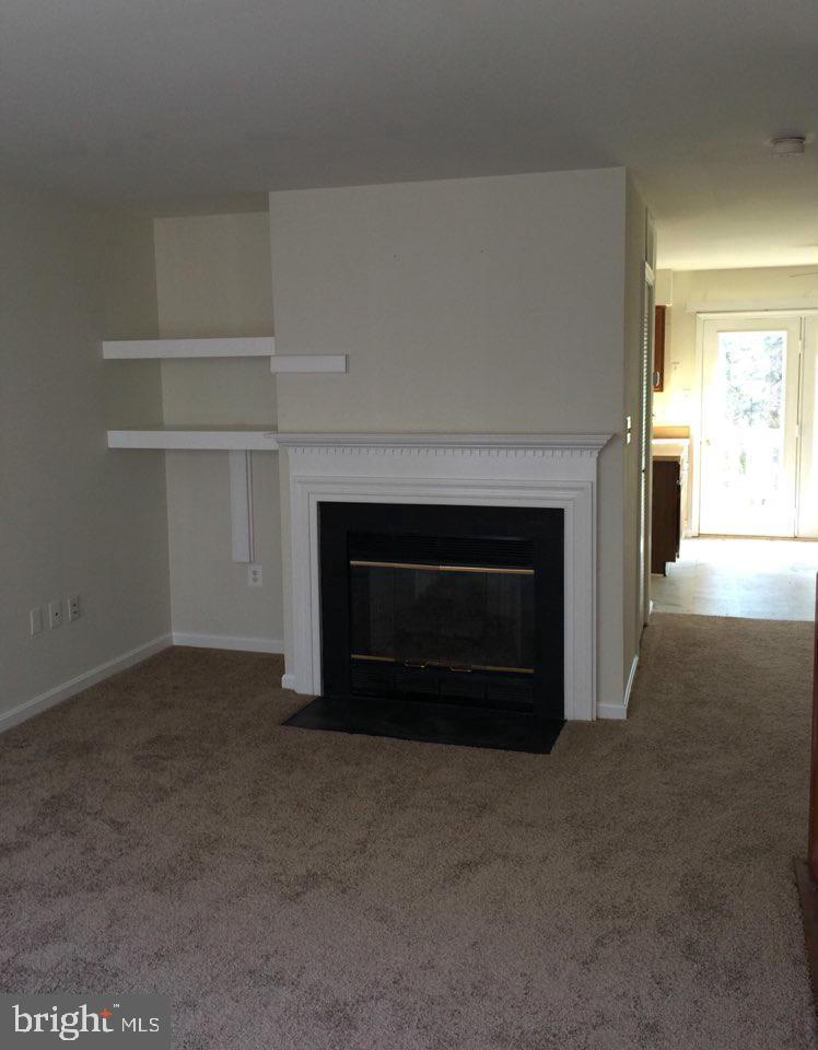 6328 Over See Court Springfield, VA 22152 - Photo 3 of 14 a living room with a fireplace