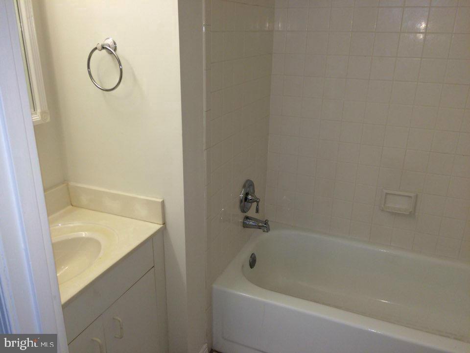 6328 Over See Court Springfield, VA 22152 - Photo 8 of 14 a bathroom with a tub and a shower