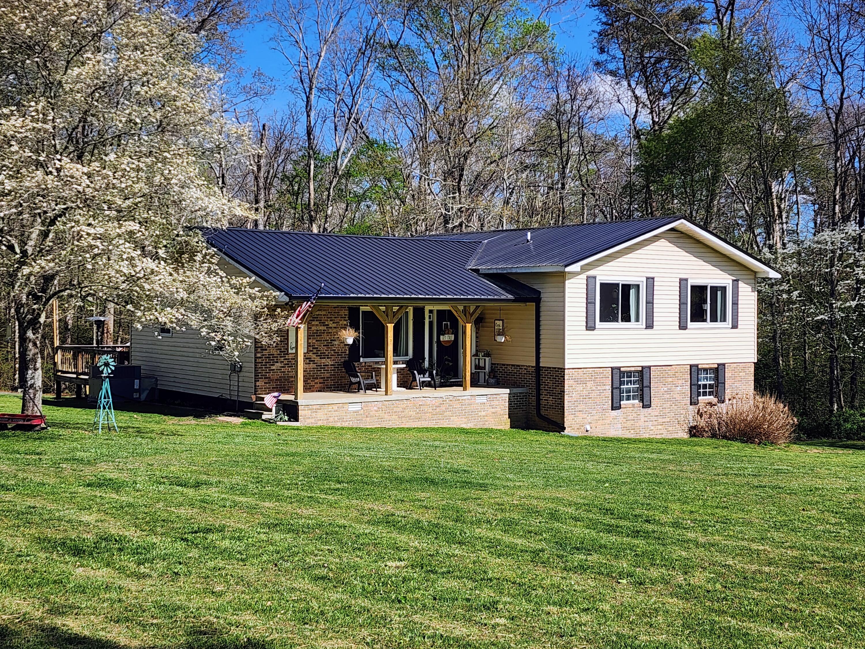 116 Keith Brewer Road Palmer, TN 37365 - Photo 1 of 70 20230416_155039