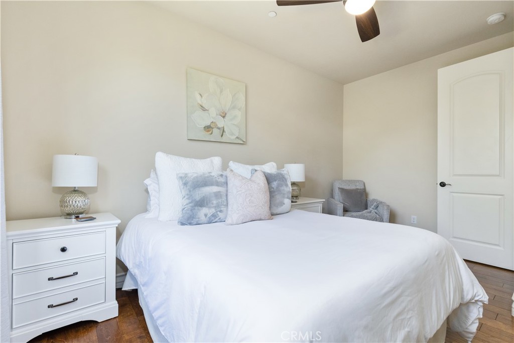 669 Red Cloud Road Paso Robles, CA 93446 - Photo 32 of 61 a bedroom with a bed and a lamp on dresser