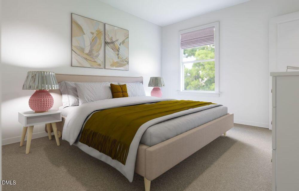 713 Bolera Road Knightdale, NC 27545 - Photo 19 of 35 a bedroom with a bed and a lamp