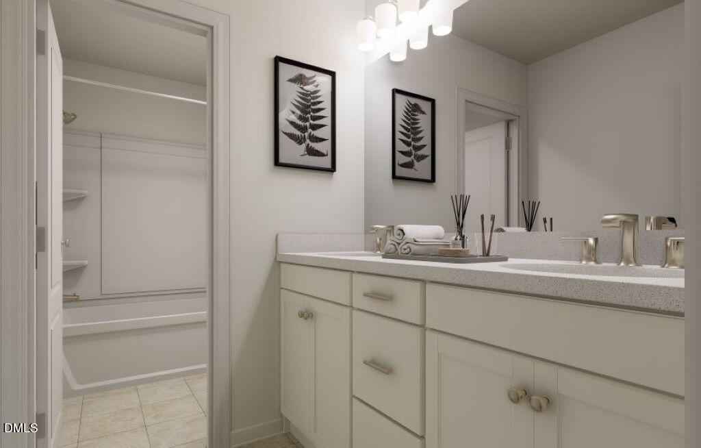 713 Bolera Road Knightdale, NC 27545 - Photo 21 of 35 a bathroom with a sink and a mirror