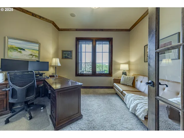 a living room with a couch and a window