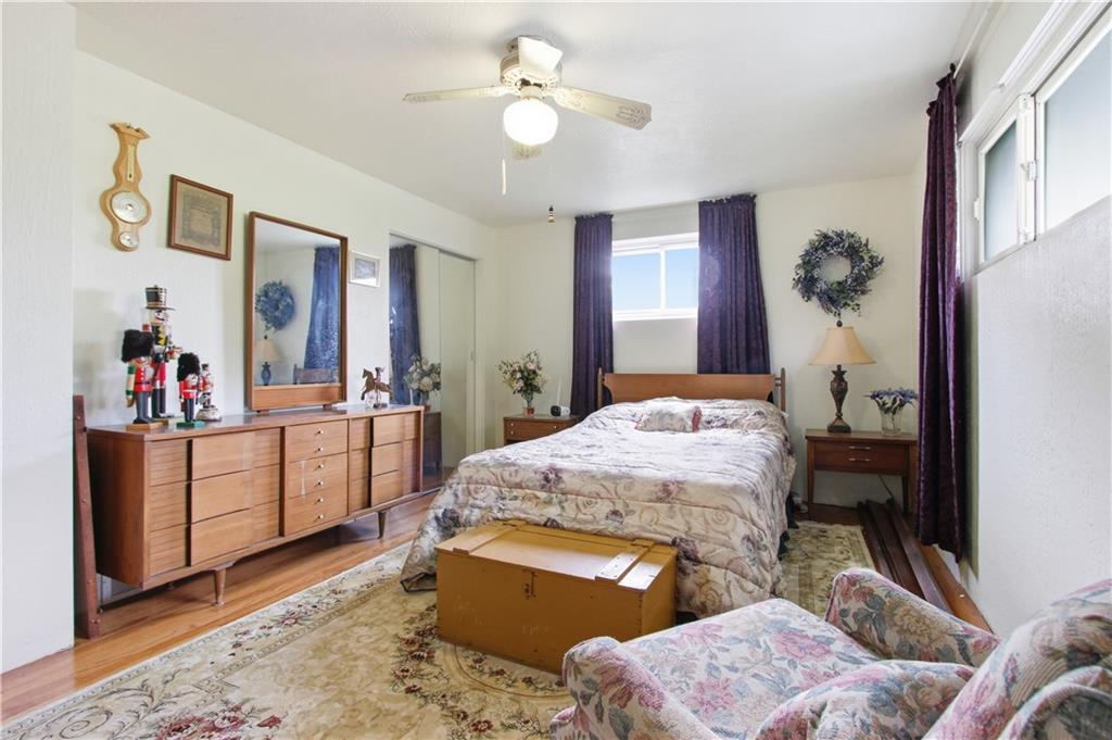 116 Hidden Valley Road Canonsburg, PA 15317 - Photo 17 of 33 This spacious primary bedroom offers the buyer, gleaming hardwood floors that create a warm, inviting retreat. A spacious closet with additional shelving.