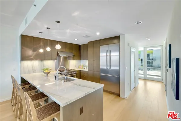 a view of a dining area with furniture and wooden floor