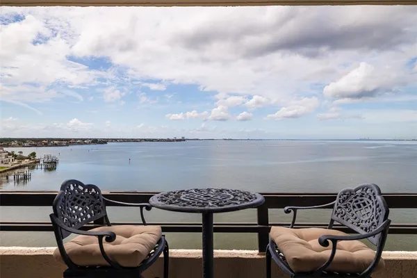 a view of a terrace with couches and a table