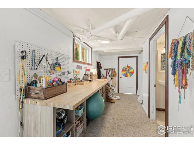 a view of a living room and bathroom
