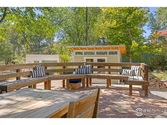 a view of a chairs and table on the terrace